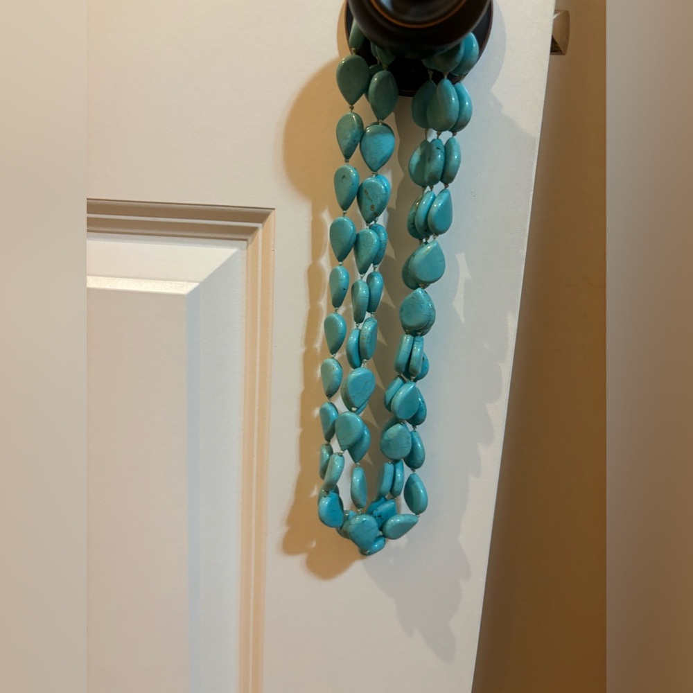 Three strand turquoise stone necklace